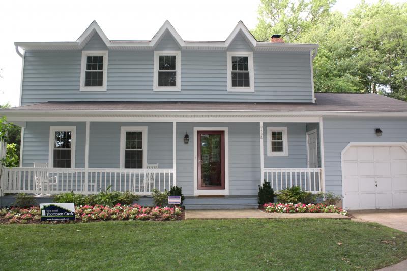 Blue siding on two story home