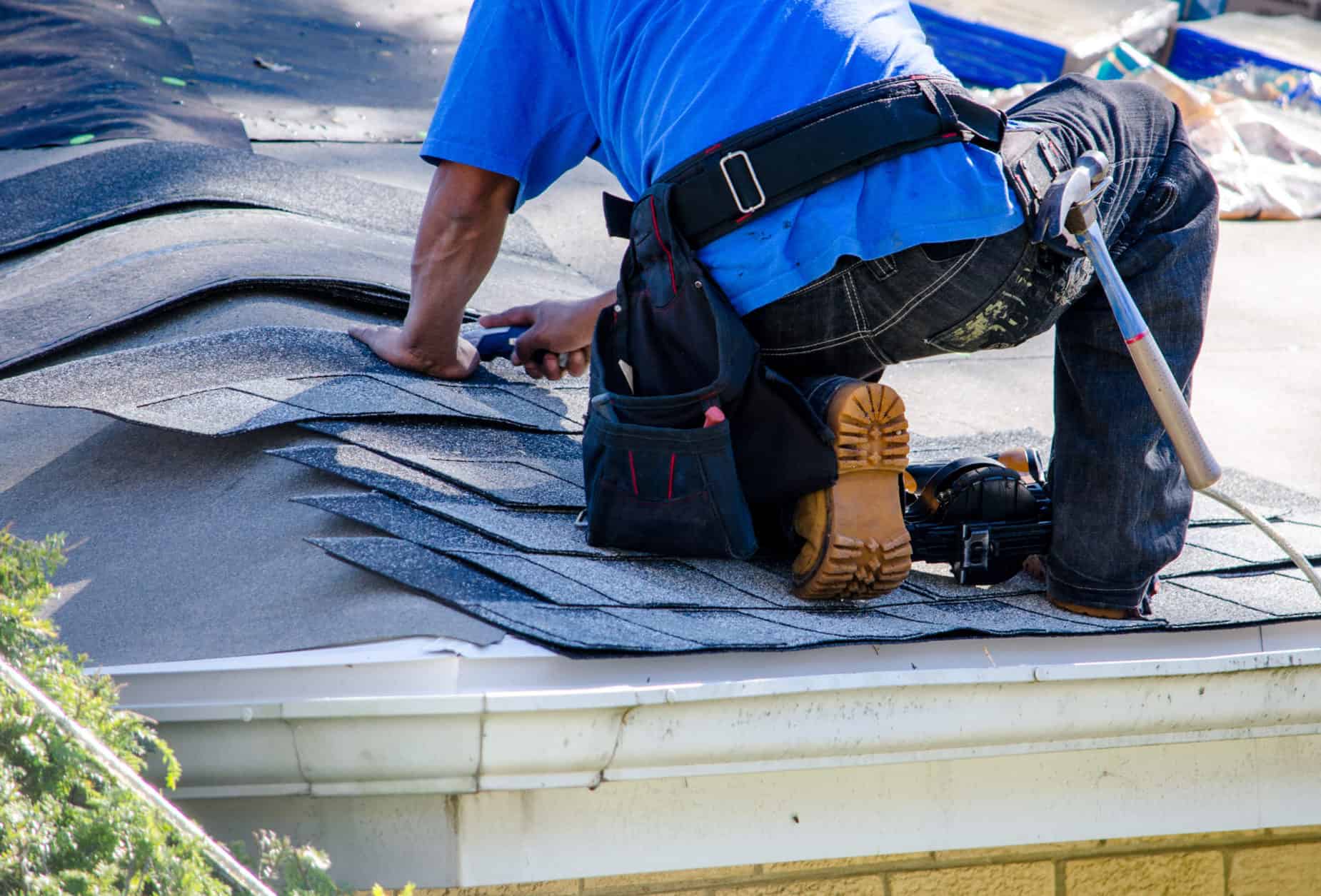 Man Installing a Roof
