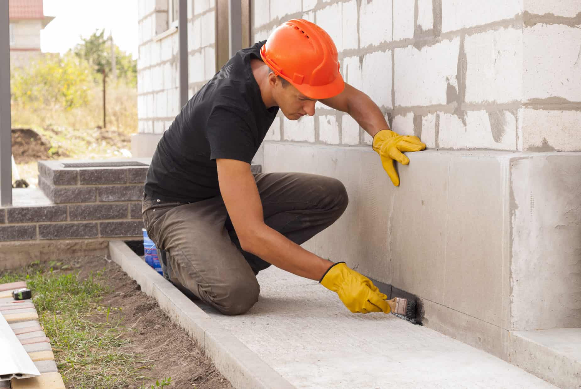 Person Repairing Foundation