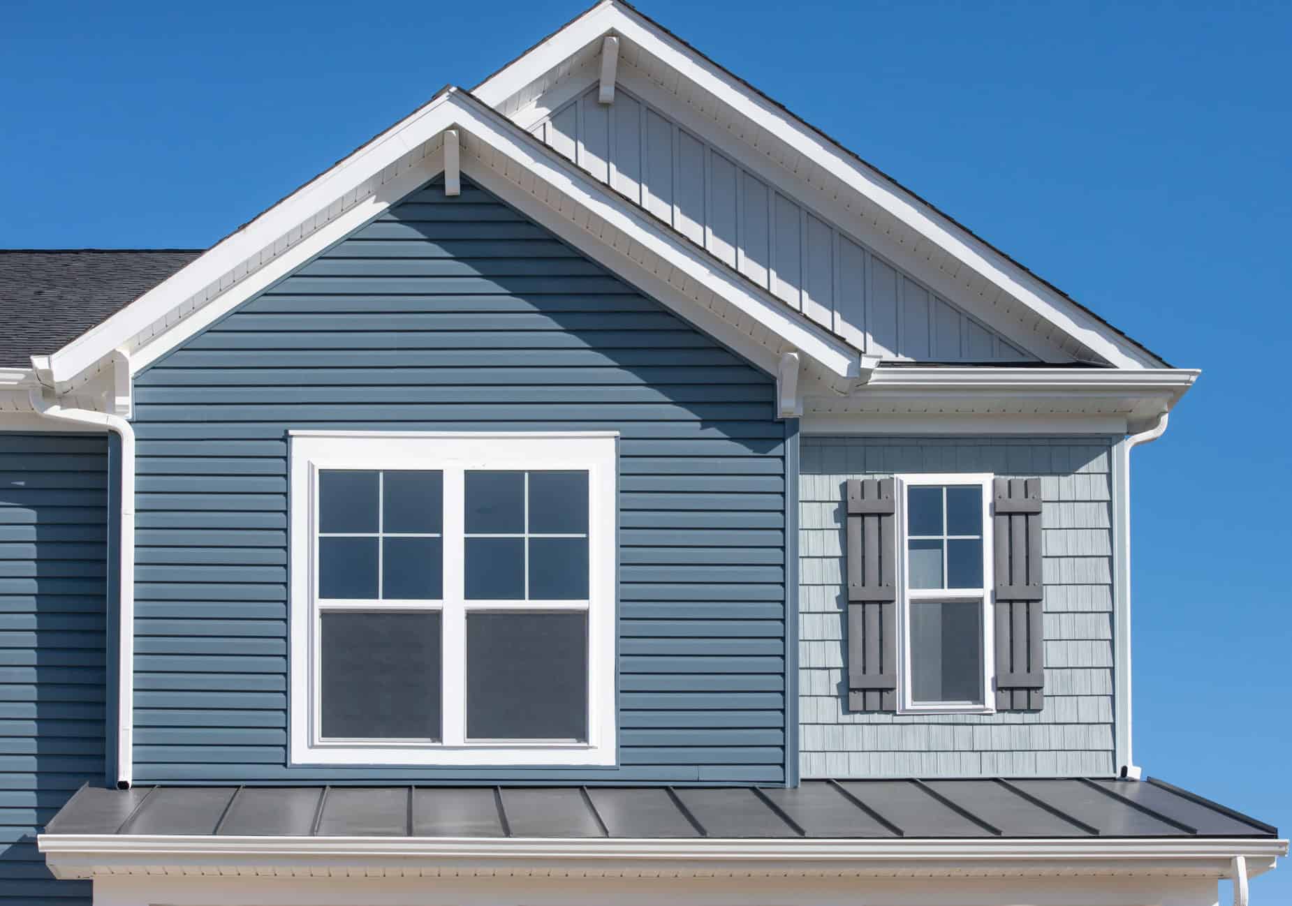 house with 3 types of siding
