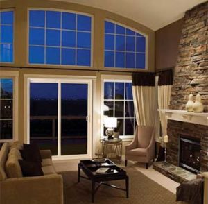 Interior view of white sliding glass patio doors with large transom