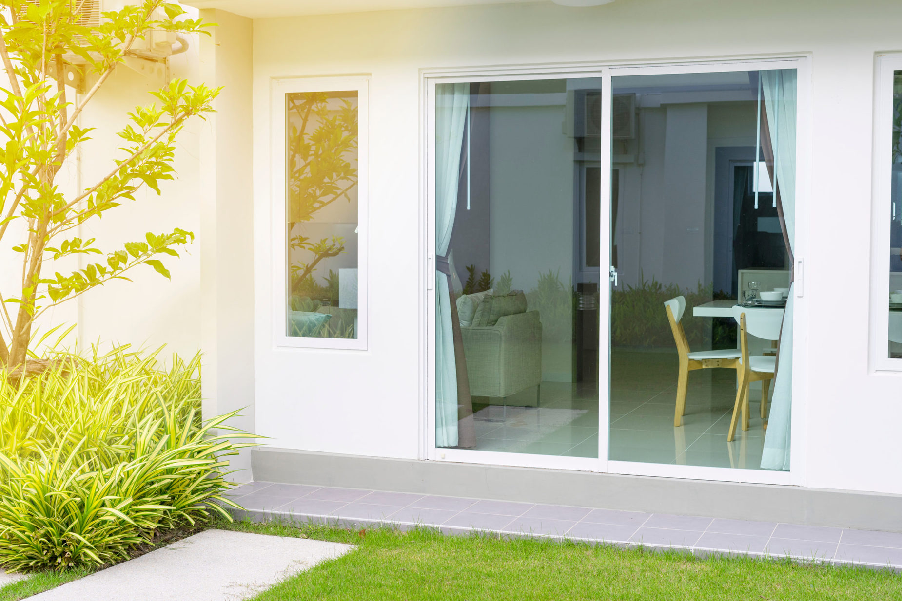 Glass,Window,Door,Open,To,The,Private,Garden,Of,The