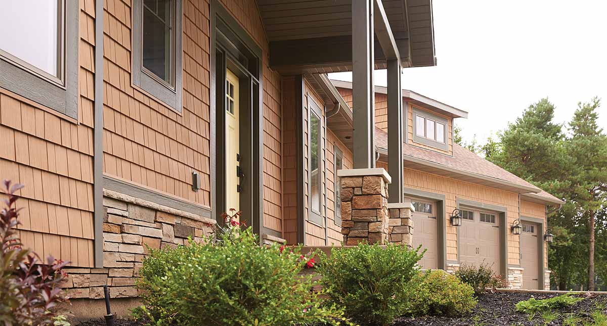 Red vinyl siding on home