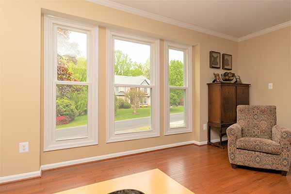 Three white Thompson Creek windows in living room