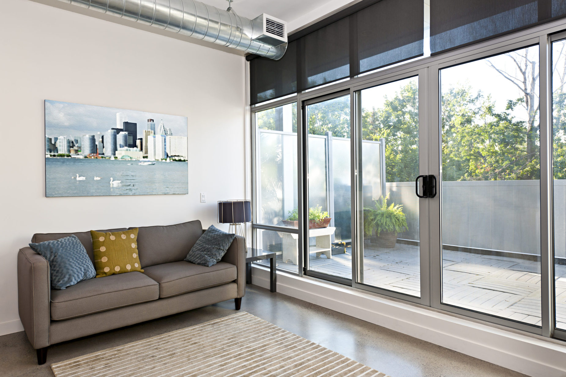 Living,Room,With,Sliding,Glass,Door,To,Balcony