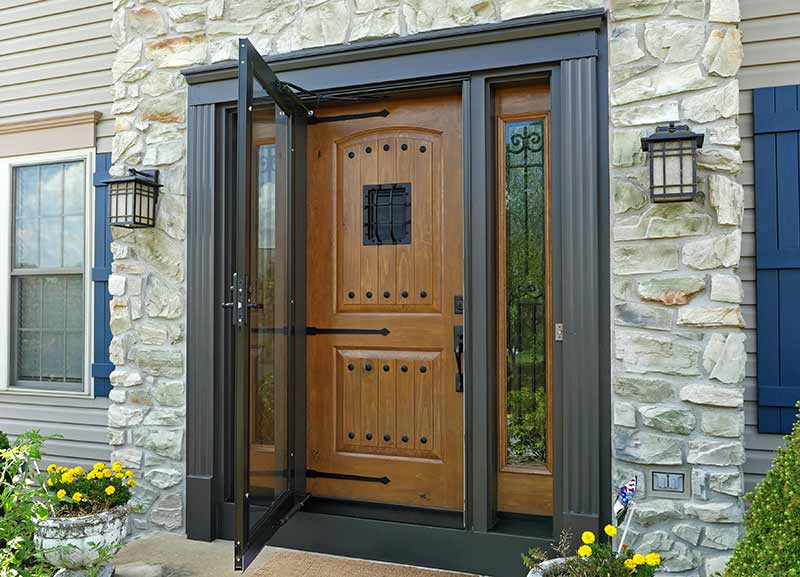 Custom front door with dark brown vinyl energy efficient glass