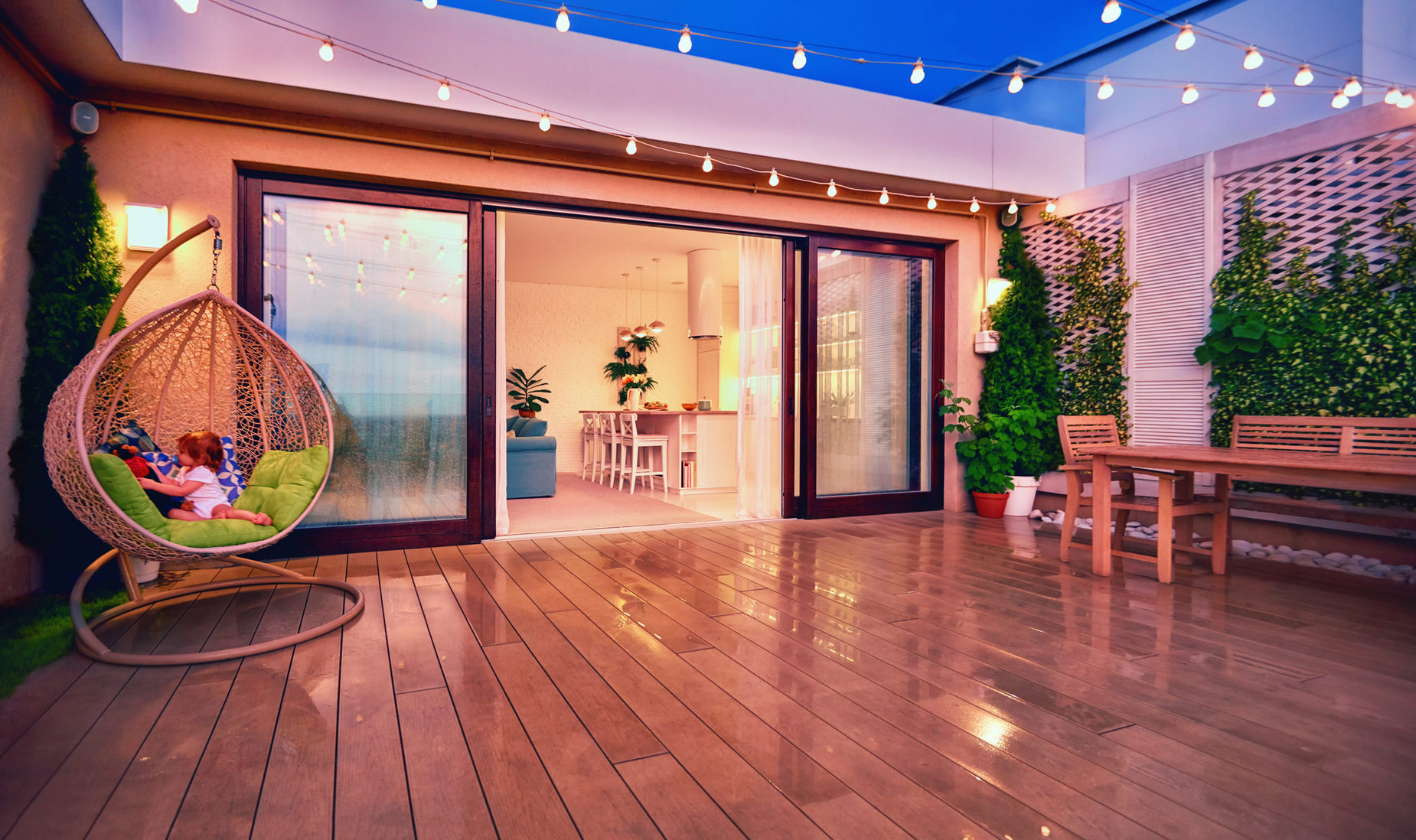 Cozy,Rooftop,Patio,With,Sliding,Doors,In,The,Evening,After