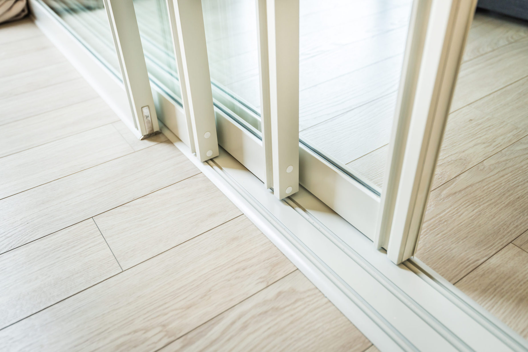 Sliding,Glass,Door,Detail,And,Rail,Embed,In,Wooden,Floor